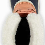 Sorel Ladies Winter Carnival Boot 2022-2023 - A navy blue boot with a white fur trim around the top and a thick cream-colored sole.