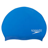 Speedo Elastomeric Solid Silicone Swim Cap - A solid blue swim cap made of silicone, featuring a smooth texture and no visible patterns or logos.