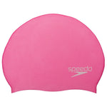 Speedo Elastomeric Solid Silicone Swim Cap - A solid pink swim cap made of silicone, featuring a smooth texture and no visible patterns or logos.