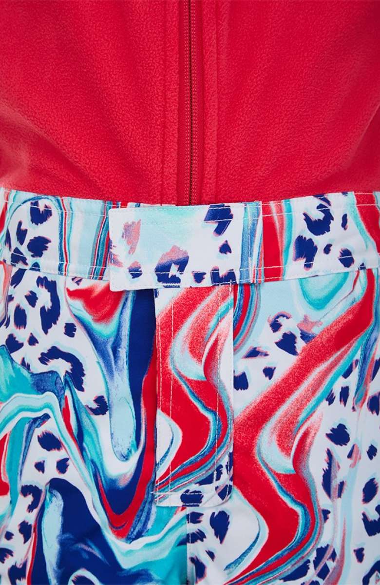 Spyder Bitsy Girls Sparkle Pant 2022 - A pair of girls' sparkly snow pants with a glittering silver pattern on a black background.