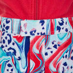 Spyder Bitsy Girls Sparkle Pant 2022 - A pair of girls' sparkly snow pants with a glittering silver pattern on a black background.