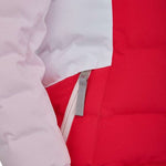 Spyder Girls Atlas Synthetic Down Jacket 2022 - A pink jacket with a white zipper and two pockets on either side, featuring a hood and a drawstring waist.