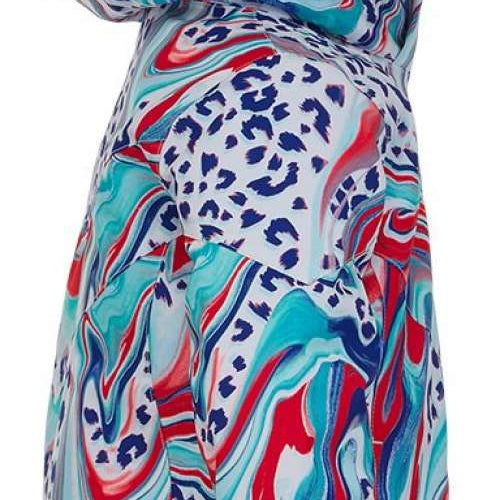 Spyder Girls Lola Insulated Jacket 2022 - A white jacket with a leopard print design in shades of red, blue and turquoise.