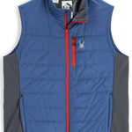 Spyder Glissade Hybrid Insulated Vest 2023 - A blue vest with a white spider logo on the left chest and red zipper.