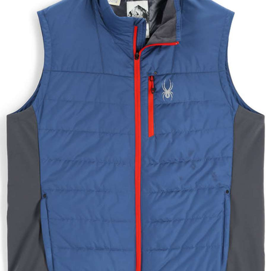 Spyder Glissade Hybrid Insulated Vest 2023 - A blue vest with a white spider logo on the left chest and red zipper.