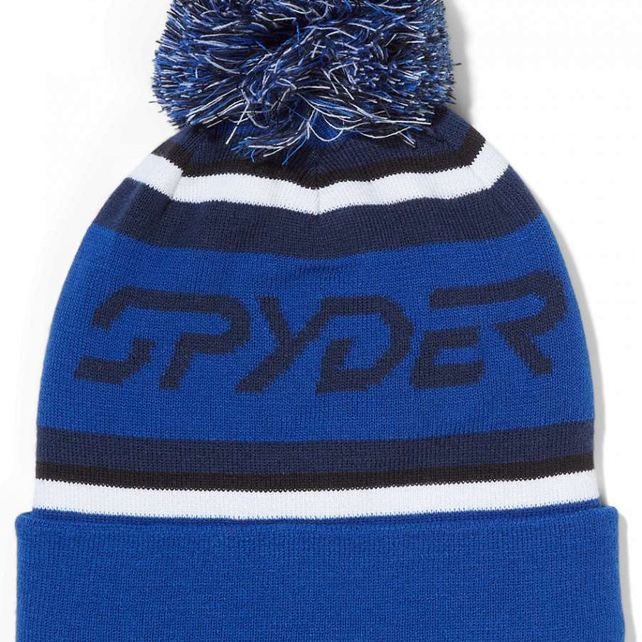 Spyder Icebox Hat 2024 - A royal blue knit beanie with a large, fluffy pom-pom on top.