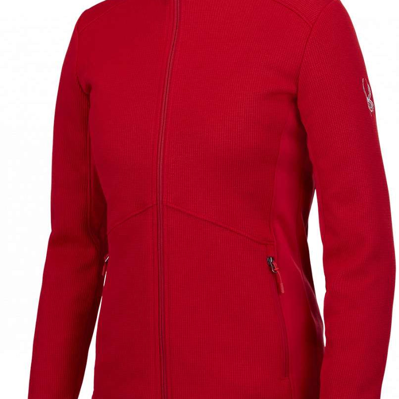 Spyder Ladies Bandita Full-Zip Fleece Jacket 2023 - A red fleece jacket with a full zip and two side pockets, featuring a white logo on the left sleeve.