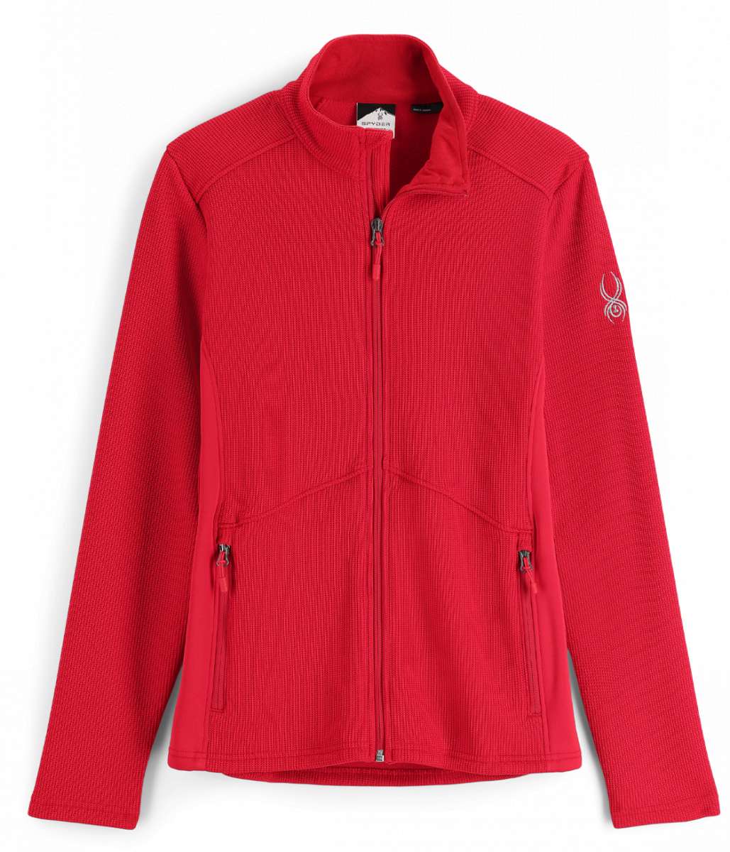 Spyder Ladies Bandita Full-Zip Fleece Jacket 2023 - A red fleece jacket with a zippered front and two side pockets, featuring a white logo on the left sleeve.