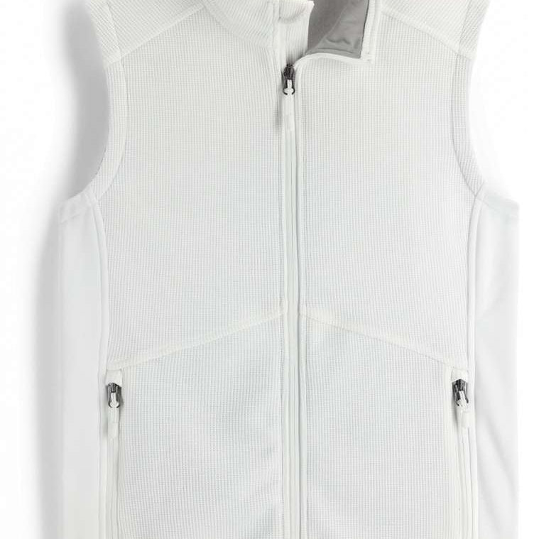 Spyder Ladies Bandita Full-Zip Fleece Vest 2023 - A white fleece vest with a zippered front and two side pockets, featuring a small logo on the bottom right corner.