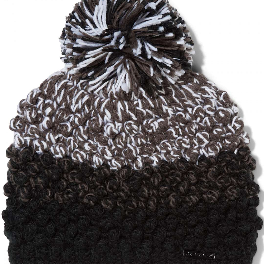 Spyder Ladies Brr Berry Hat 2024 - A brown knit beanie with a white pom-pom on top.