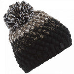 Spyder Ladies Brrr Berry Beanie 2023 - A black beanie with a brown and white marbled pattern on top, featuring a large pom-pom at the tip.