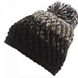 Spyder Ladies Brrr Berry Beanie - A black beanie with a brown and white pom-pom on top.
