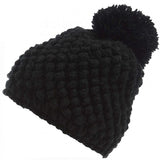 Spyder Ladies Brrr Berry Beanie - A black beanie with a pom-pom on top, featuring a berry pattern.