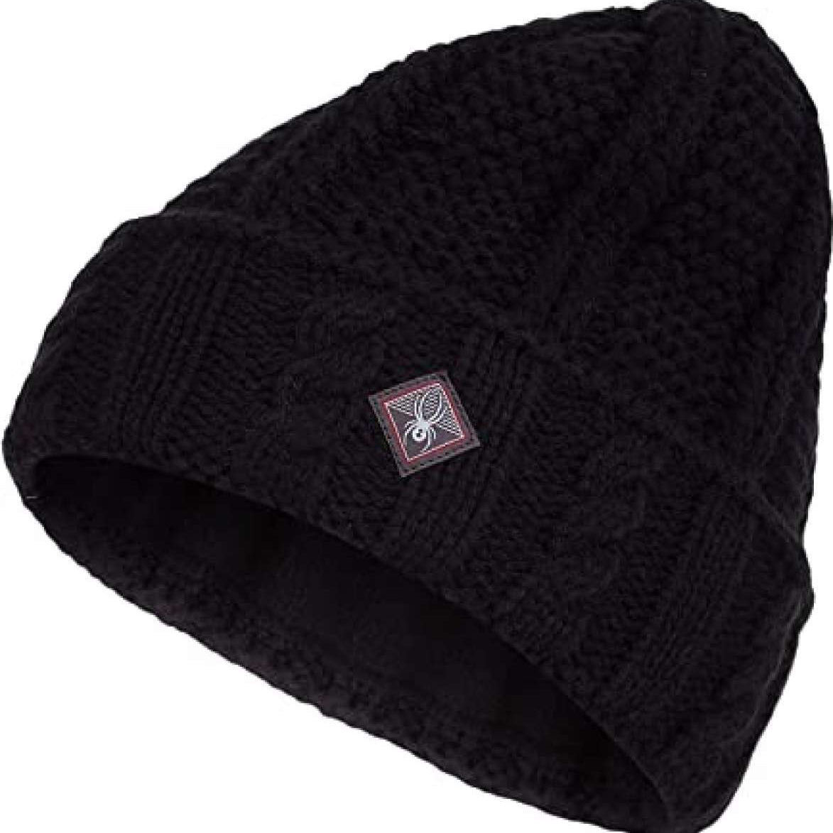 Spyder Ladies Cable Knit Hat 2022 - A black cable-knit beanie with a small embroidered white spider logo on the front.