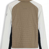 Spyder Ladies Glissade Hybrid Insulated Jacket 2023 - A tan jacket with a high collar and quilted back, featuring a logo on the upper left chest area.