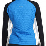 Spyder Ladies Glissade Hybrid Insulated Jacket 2023 - A blue jacket with a high collar and white accents on the sides, worn by a model facing away from the camera.
