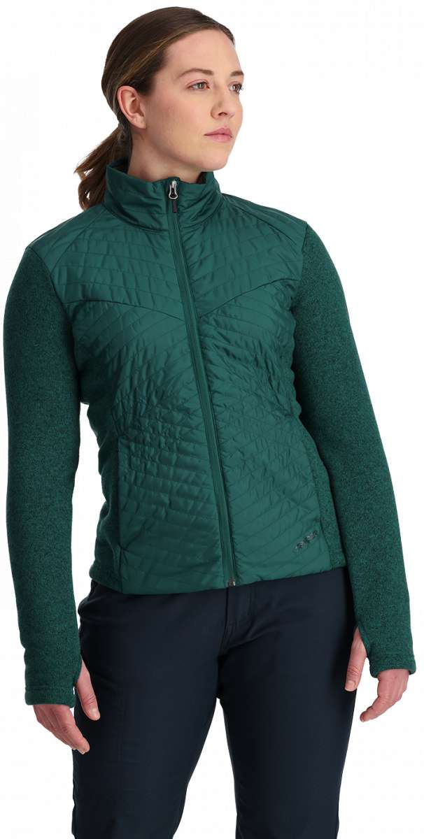 Spyder Ladies Pursuit Insulator Jacket 2024 - A dark green quilted jacket with a high collar and zippered front, worn by a model against a light gray background.