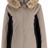 Spyder Ladies Vida Insulated Faux Fur Jacket 2023 - A tan jacket with a faux fur-lined hood and black accents on the sides.
