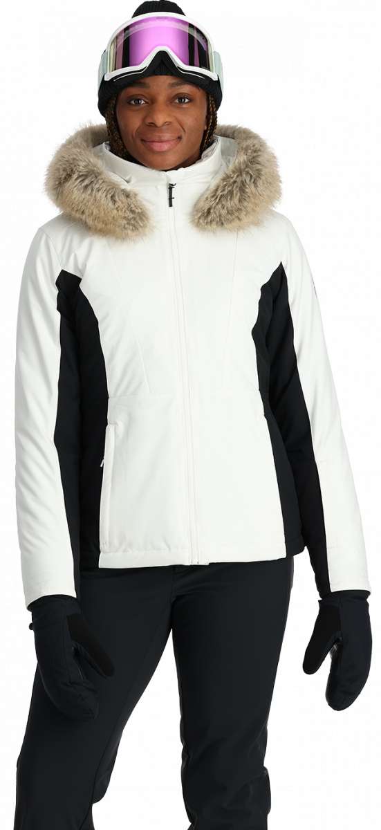 Spyder Ladies Vida Insulated Faux Fur Jacket 2024 - A white jacket with a faux fur-lined hood and black accents on the sleeves.