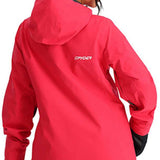 Spyder Ladies Volt GORE-TEX Jacket 2024 - A woman wearing a white knit beanie with gray pom-pom and black gloves, facing away from the camera, showcasing the back of this jacket in red.