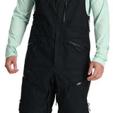 Spyder Sanction GORE-TEX Shell Bib Pants 2024 - Black bib pants with a white logo on the left thigh and black straps over shoulders.