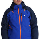 Spyder Vanqysh GORE-TEX Jacket 2024 - A royal blue jacket with orange accents and a white spider logo on the left chest.