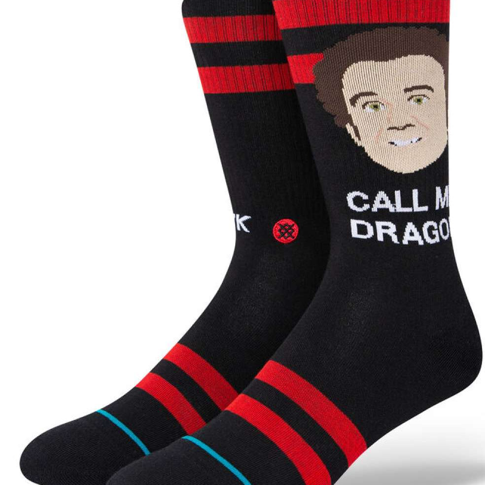 Stance Best Friends Crew Socks 2023 - A pair of black crew socks with a repeating pattern of cartoon characters in various colors.