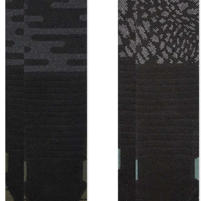 Stance Black Diamond Snow SB Sock 2-Pack 2024 - A pair of black socks with a subtle snowflake pattern on the top portion.