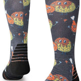 Stance Bock Bock Snow Crew Sock 2024 - A pair of gray crew socks with a repeating pattern of yellow and orange snowboarders in action poses.