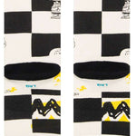 Stance Kids Checked Crew Sock 2023 - A black-and-white checked pattern with a small cartoon character in the top left corner.