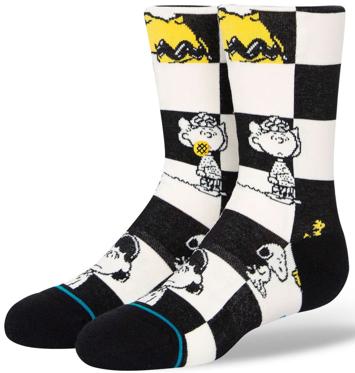 Stance Kids Checked Crew Sock 2023 - A black-and-white checked crew sock with a yellow and black cartoon dog design on the top of each foot.