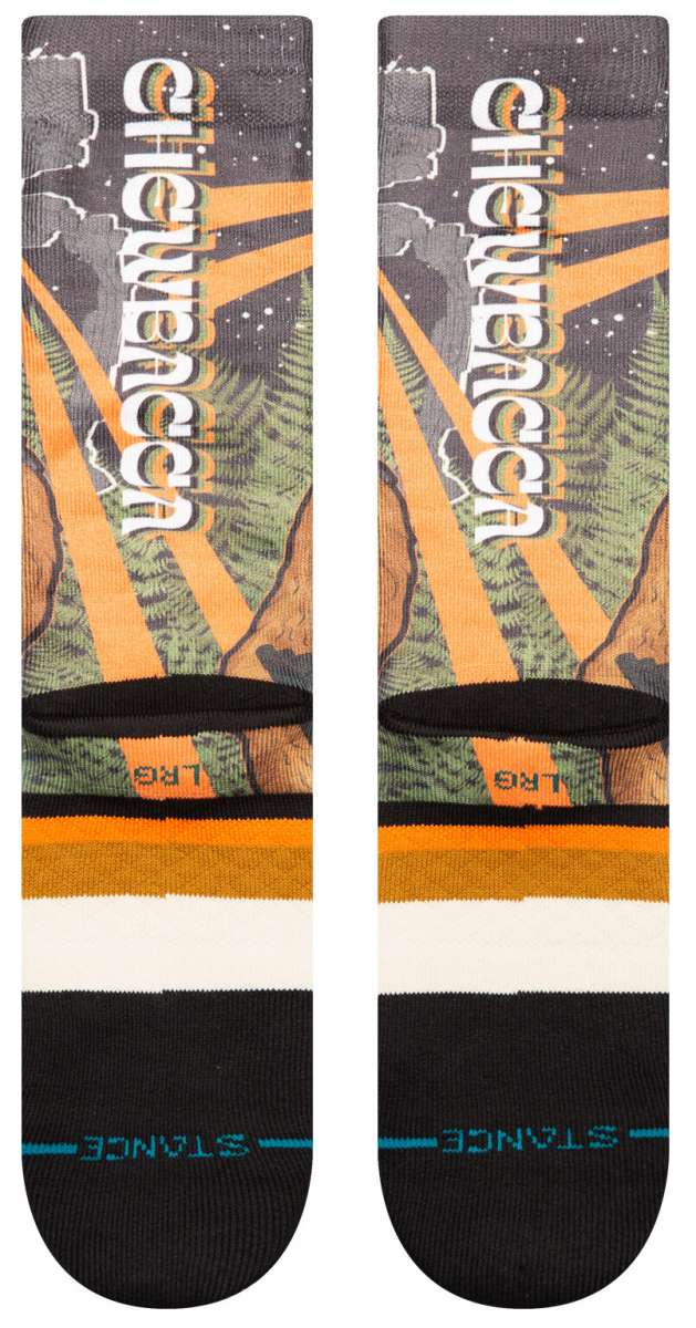 Stance Chewie By Jaz Crew Sock 2024 - A pair of crew socks with a brown and tan color scheme, featuring a pattern of Chewbacca's face from Star Wars.