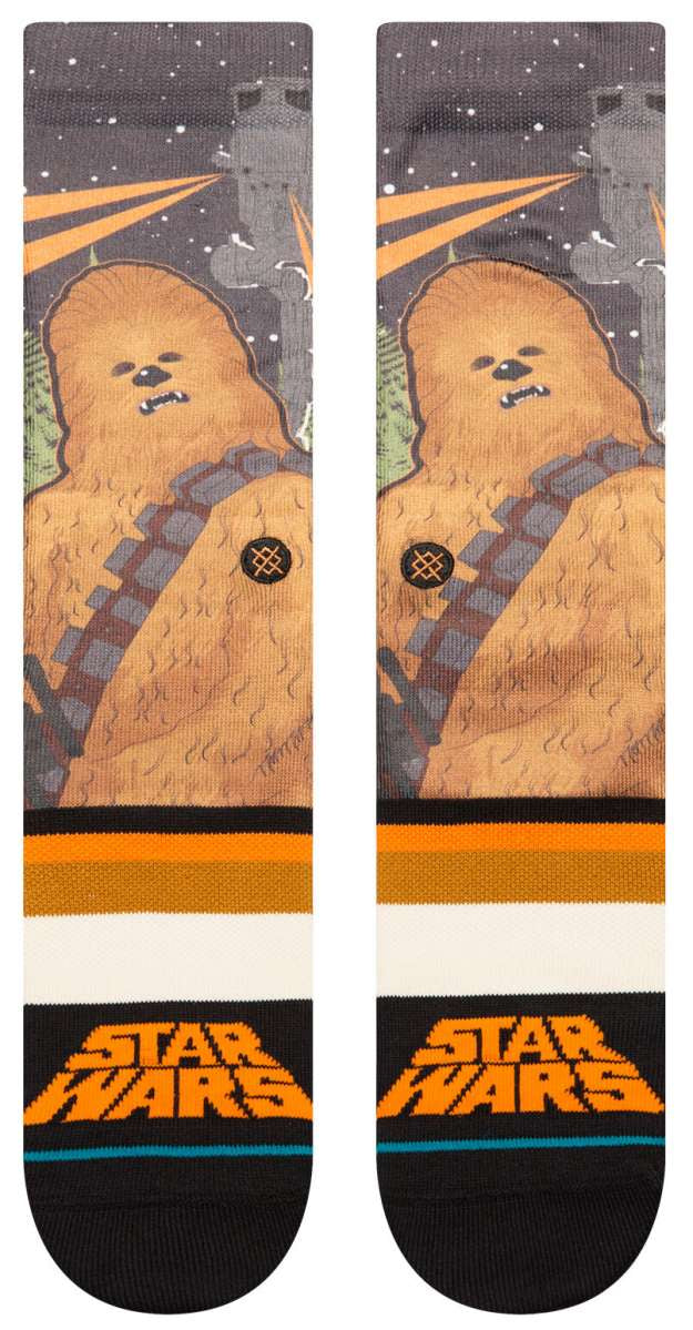 Stance Chewie By Jaz Crew Sock 2024 - A pair of crew socks featuring a large, furry Wookiee character from Star Wars with a brown body and gray bandolier.