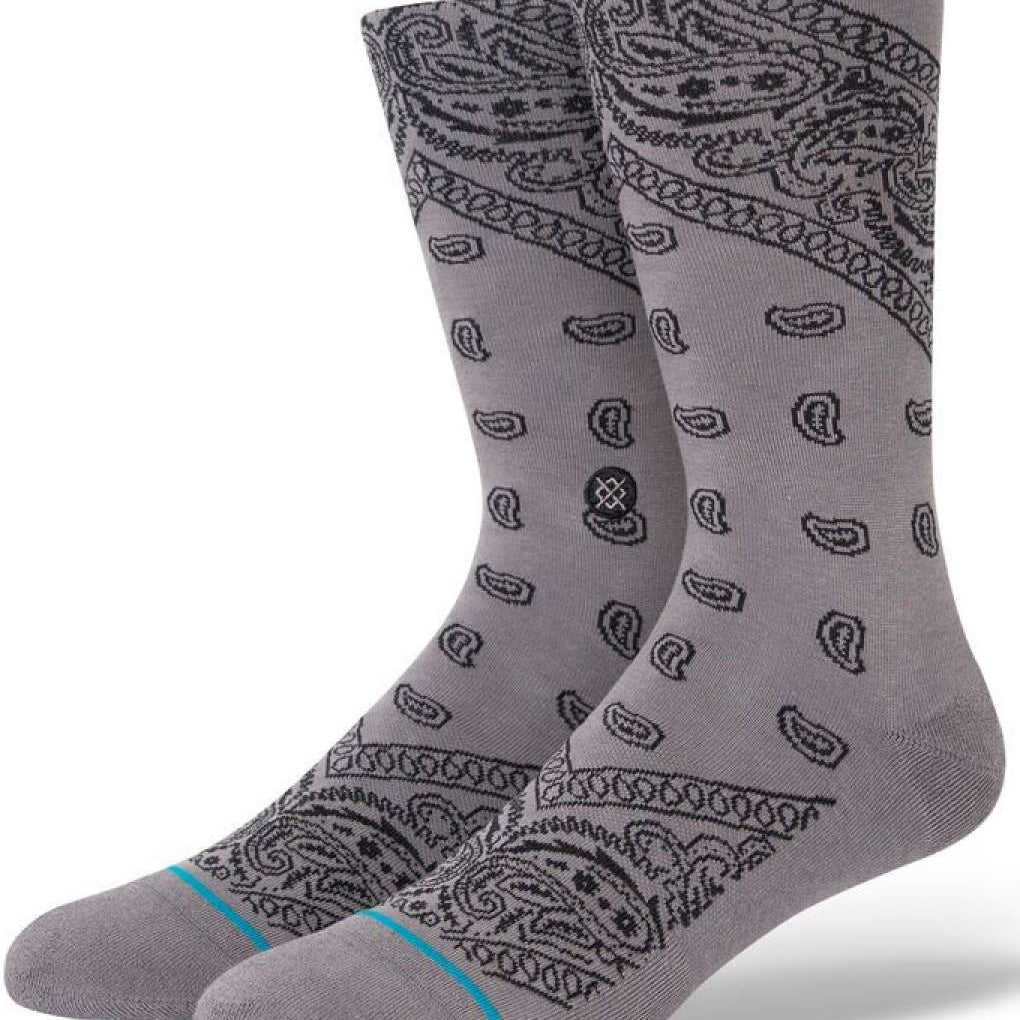Stance El Barrio Crew Sock 2023 - A pair of gray crew socks with a paisley pattern and turquoise stripe at the toe.