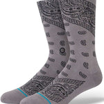 Stance El Barrio Crew Sock 2023 - A pair of gray crew socks with a paisley pattern and turquoise stripe at the toe.
