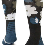 Stance Fields Snow Sock 2023 - Black snow socks with white flowers and green leaves.