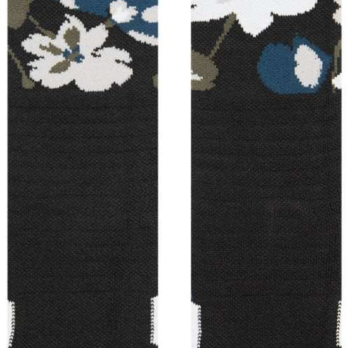 Stance Fields Snow Sock 2023 - White snowflakes on a black background with blue accents and gray leaves.