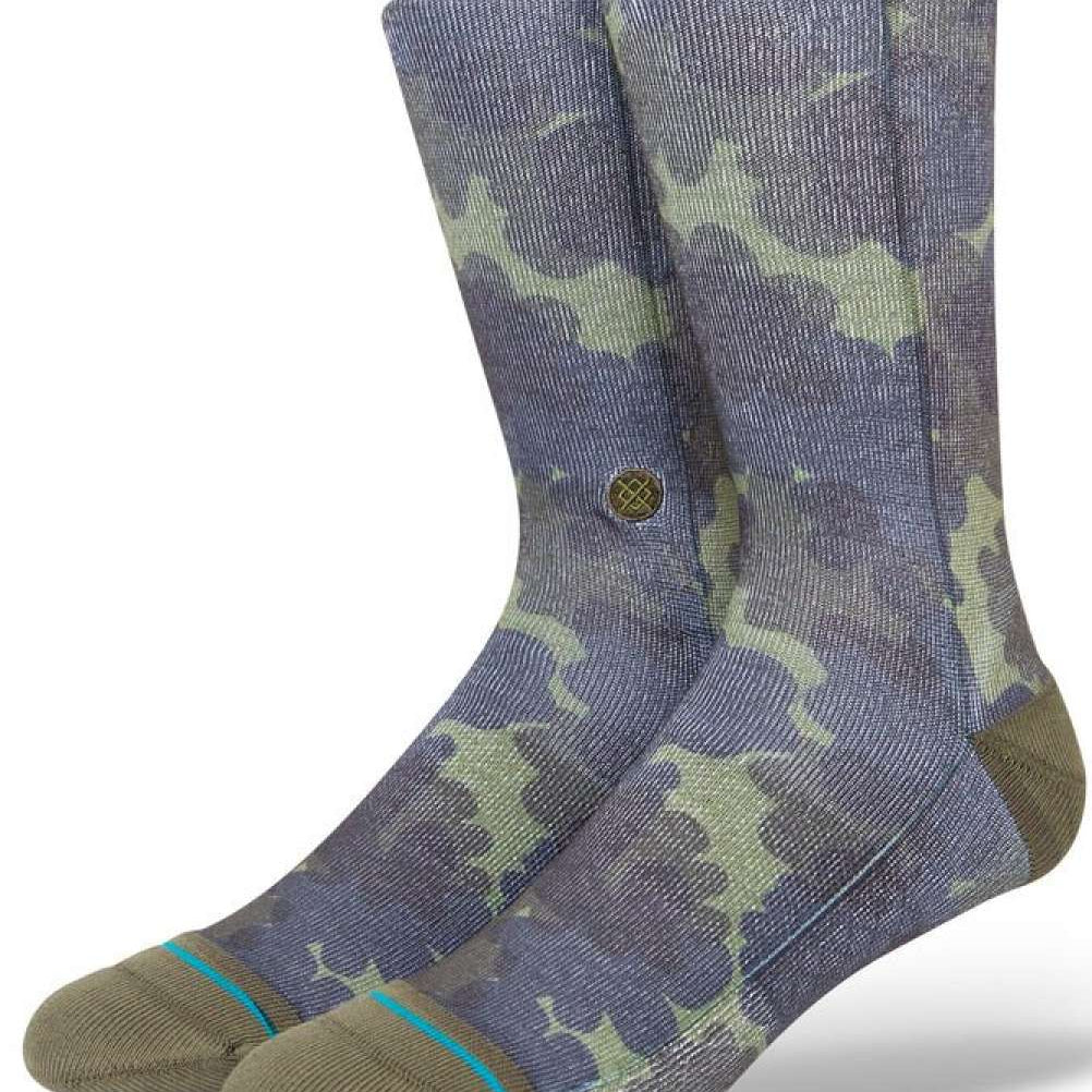 Stance Hydrangea Crew Sock 2023 - A pair of crew socks in a light purple color with a subtle floral pattern.
