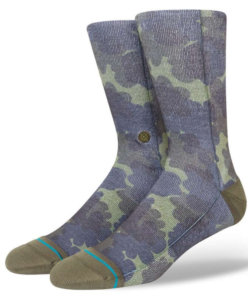Stance Hydrangea Crew Sock 2023 - A pair of crew socks in a light purple color with a subtle floral pattern.