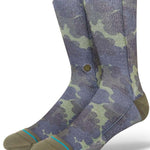 Stance Hydrangea Crew Sock 2023 - A pair of crew socks in a light purple color with a subtle floral pattern.