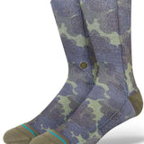 Stance Hydrangea Crew Sock 2023 - A pair of crew socks in a light purple color with a subtle floral pattern.