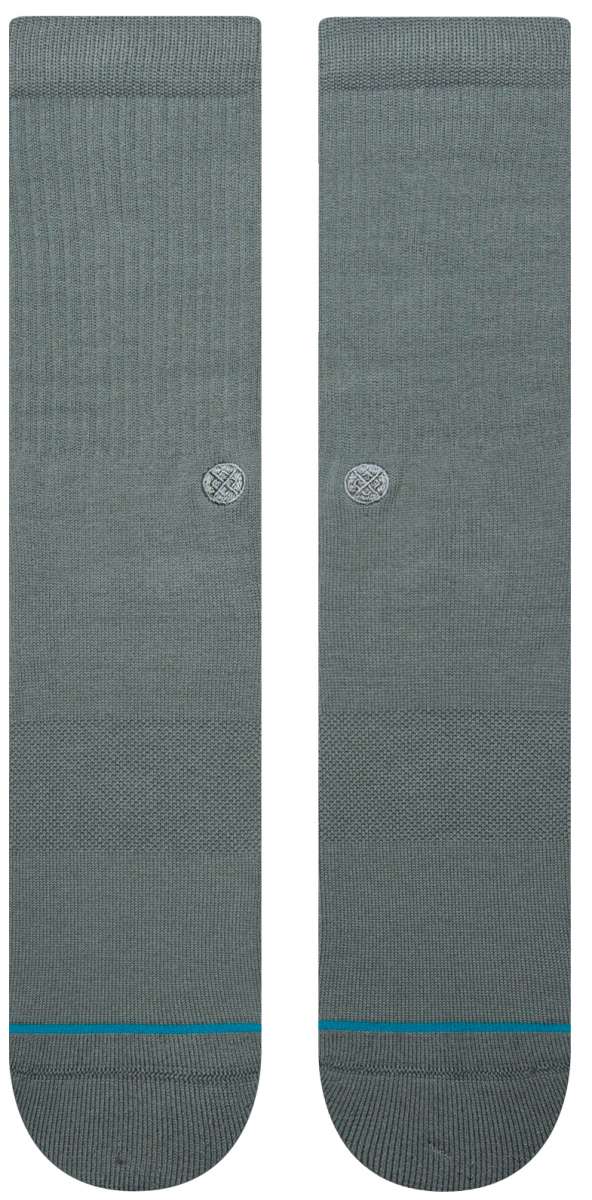 Stance Icon Crew Sock 2024 - A pair of gray crew socks with a circular logo on the ankle area.