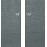 Stance Icon Crew Sock 2024 - A pair of gray crew socks with a circular logo on the ankle area.