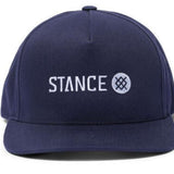 Stance - A navy blue hat with a white logo featuring an interlocking "S" and "T" design on the front panel.