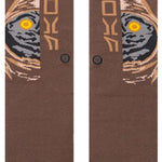 Stance Kids Jawa Crew Sock 2023 - A pair of brown crew socks with a stylized image of a character from Star Wars, possibly a young Jawa, in shades of gray and tan.