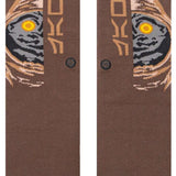 Stance Kids Jawa Crew Sock 2023 - A pair of brown crew socks with a stylized image of a character from Star Wars, possibly a young Jawa, in shades of gray and tan.