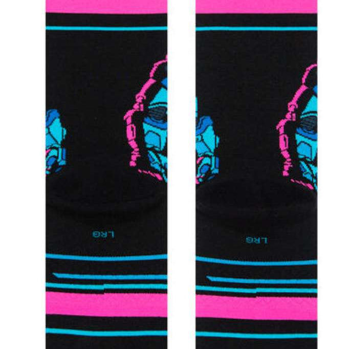 Stance Kids' Lightyear Crew Socks 2023 - A pair of black crew socks with a blue and pink pattern featuring Buzz Lightyear's face from Toy Story.