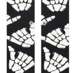 Stance Kids' Zombie Hang Crew Socks 2023 - Black socks with white zombie hands and feet in various poses.