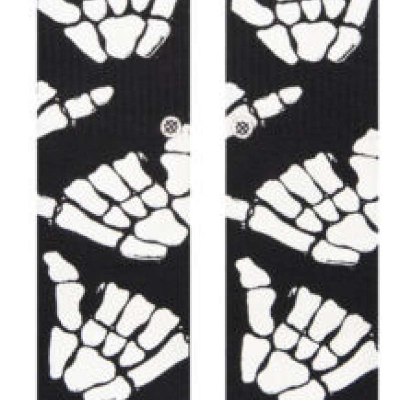 Stance Kids' Zombie Hang Crew Socks 2023 - Black socks with white zombie hands and feet in various poses.