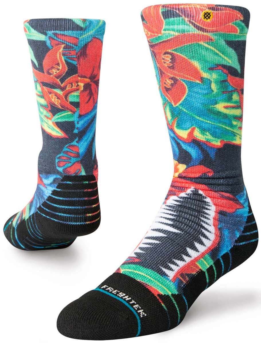 Stance Kids Bomin Snow Crew Sock 2024 - A pair of crew socks with a colorful, abstract design featuring red, blue, green, and yellow shapes on a black background.